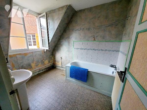 A VENDRE A AUMALE local mixte commerce/habitation proche du centre-ville