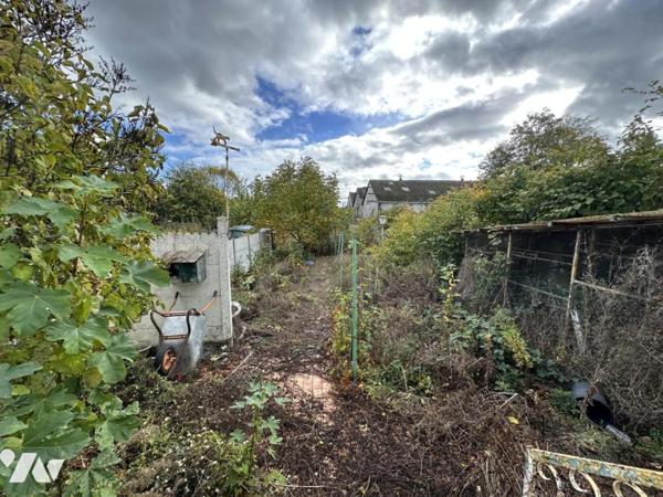 Maison de ville avec 3 garages - DENAIN