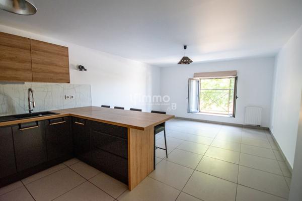 Duplex atypique dans un bâtiment historique.