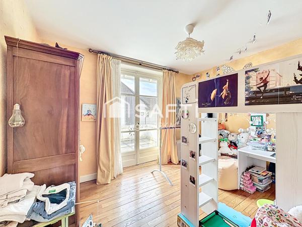 Maison de caractère de 1914 : calme et confort en plein centre