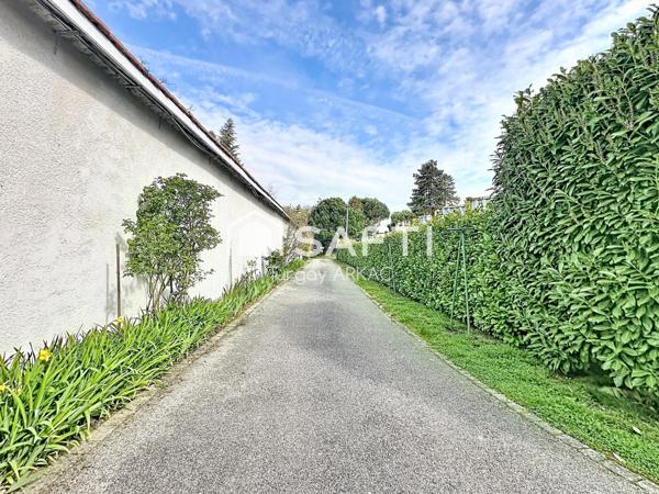 Maison de caractère de 1914 : calme et confort en plein centre