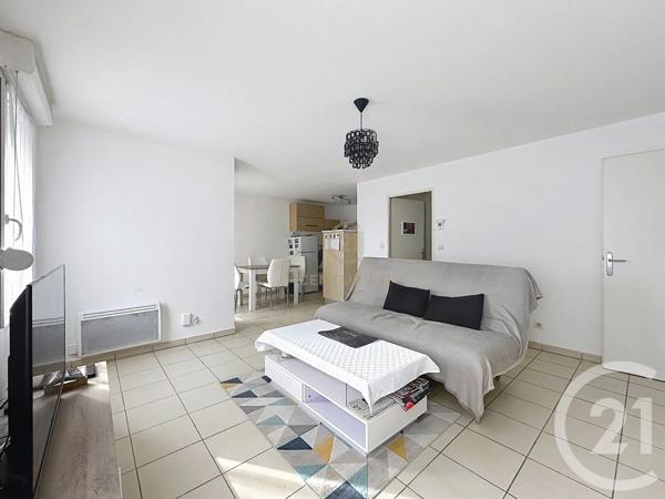 Appartement F3 à vendre  3 pièces - 63 m 2   GRIGNY  - 69