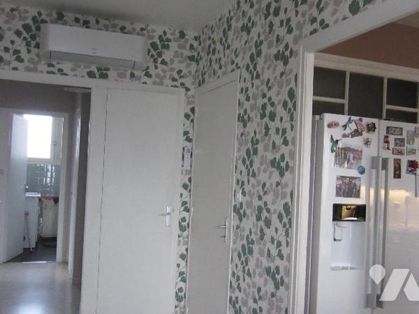 MAISON INDIVIDUELLE - JARDIN - HANGAR,  divisée en 2 logements distincts de type 4 en très bon état