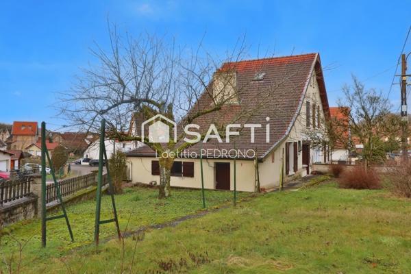 Maison avec garage, jardin et cave
