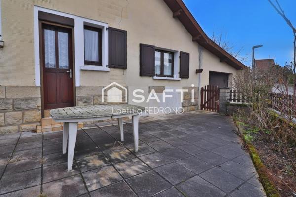 Maison avec garage, jardin et cave