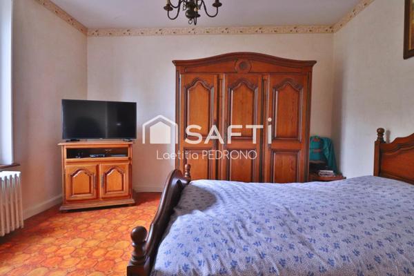 Maison avec garage, jardin et cave