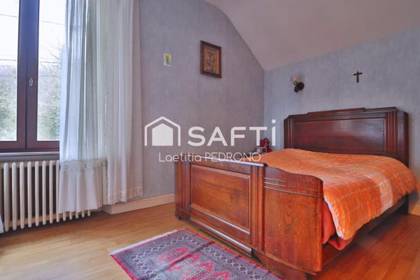 Maison avec garage, jardin et cave