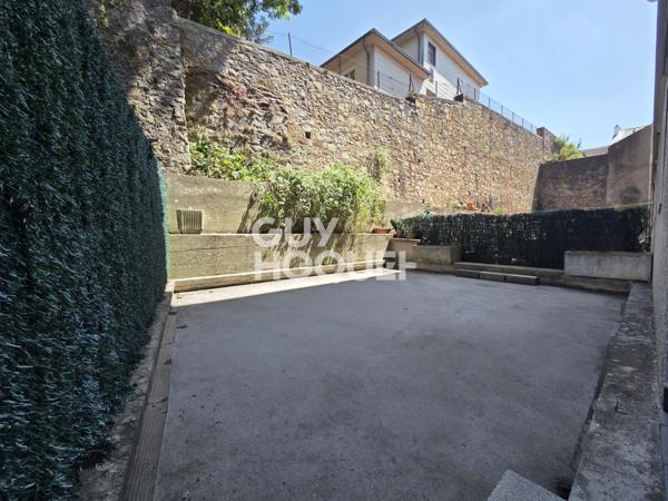 Appartement à LOUER 3 pièces de 75 m² avec parking couvert, terrasse, balcon et cave