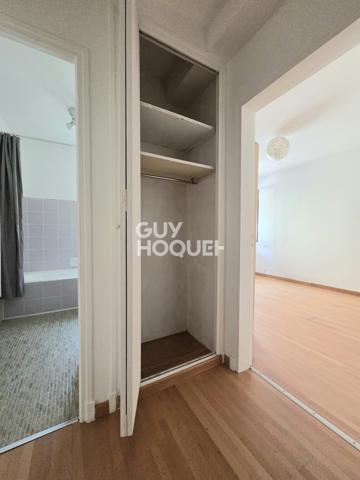 Appartement à LOUER 3 pièces de 75 m² avec parking couvert, terrasse, balcon et cave