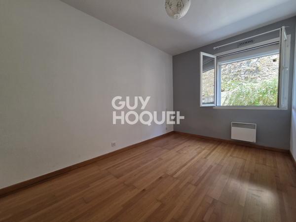 Appartement à LOUER 3 pièces de 75 m² avec parking couvert, terrasse, balcon et cave