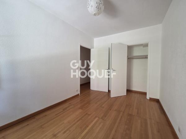 Appartement à LOUER 3 pièces de 75 m² avec parking couvert, terrasse, balcon et cave
