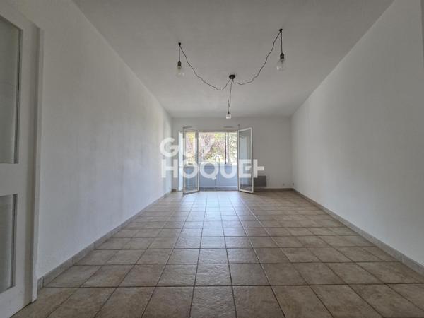 Appartement à LOUER 3 pièces de 75 m² avec parking couvert, terrasse, balcon et cave