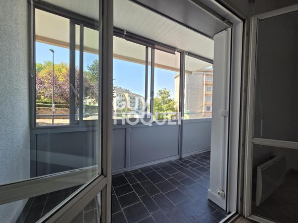 Appartement à LOUER 3 pièces de 75 m² avec parking couvert, terrasse, balcon et cave