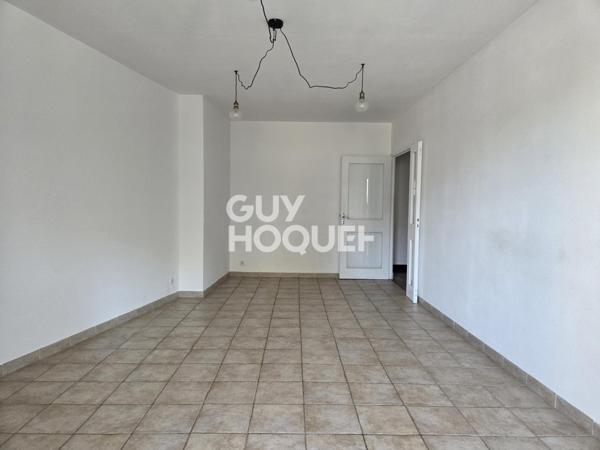 Appartement à LOUER 3 pièces de 75 m² avec parking couvert, terrasse, balcon et cave