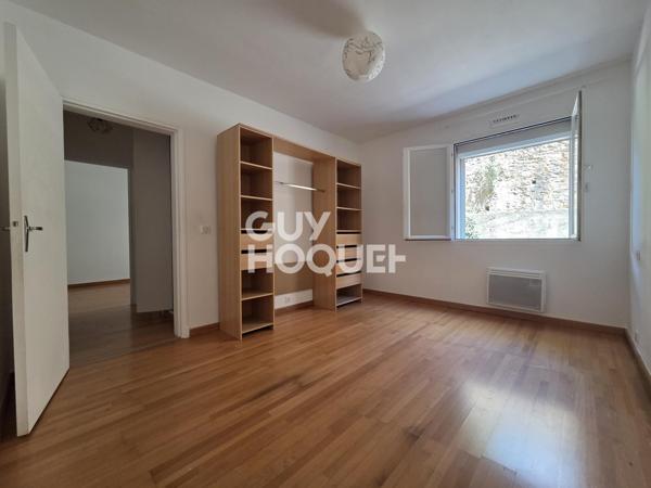 Appartement à LOUER 3 pièces de 75 m² avec parking couvert, terrasse, balcon et cave