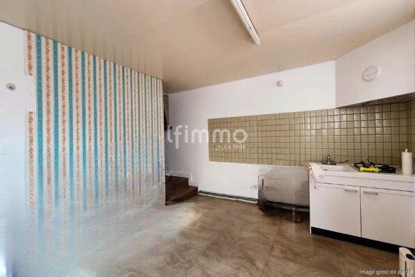 Maison de ville avec jardin à rénover