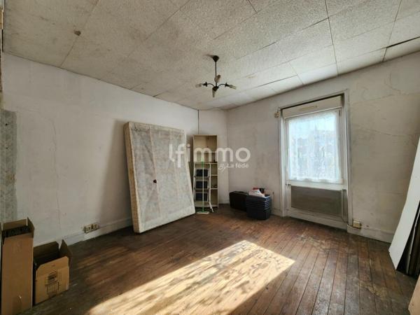 Maison de ville avec jardin à rénover