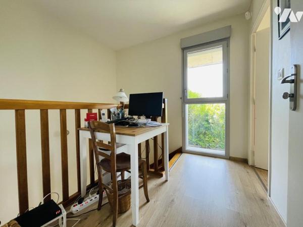 APPARTEMENT EN DUPLEX AVEC JARDIN 