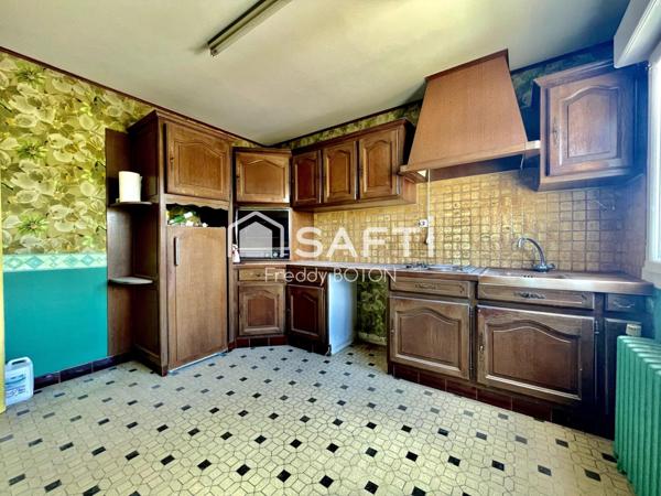 Maison avec terrain et étangs – fort potentiel !