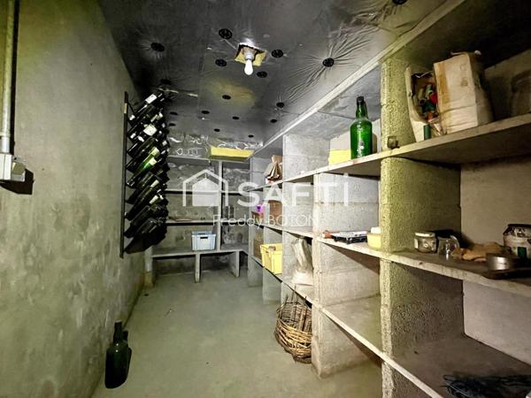 Maison avec terrain et étangs – fort potentiel !