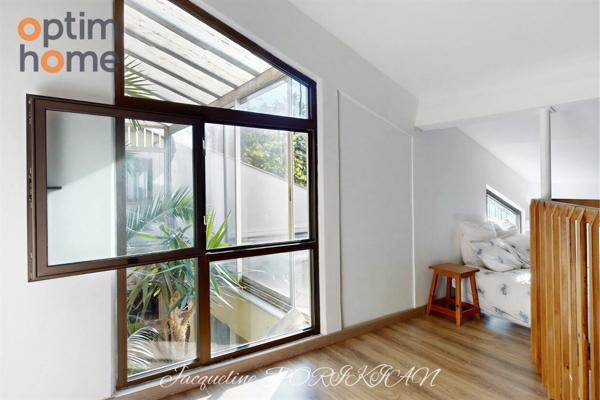 Aix en Provence : Maison d'architecte mitoyenne sur 2700m2 de jardin paysagé.