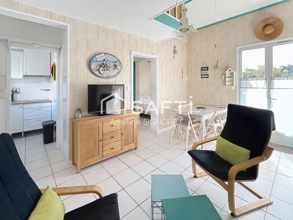 Appartement d'environ 35m² avec une chambre et une mezannine