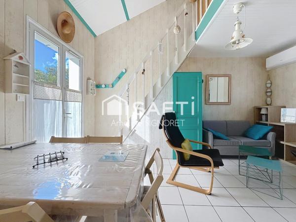 Appartement d'environ 35m² avec une chambre et une mezannine