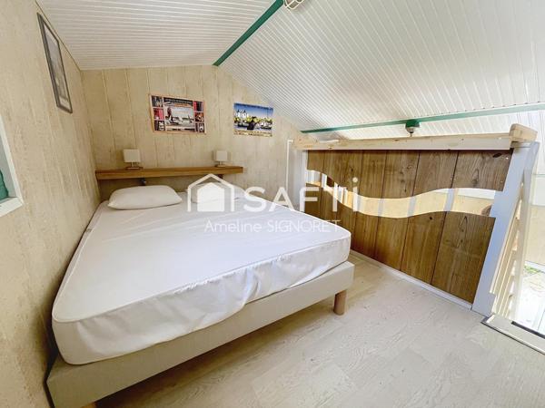 Appartement d'environ 35m² avec une chambre et une mezannine