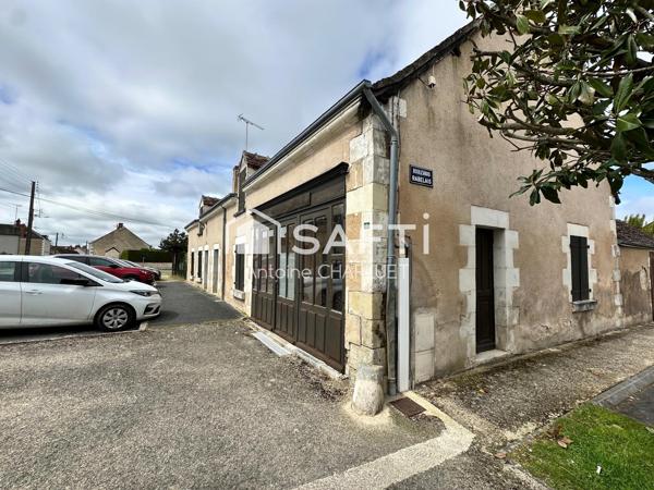 Maison avec beau potentiel locatif.