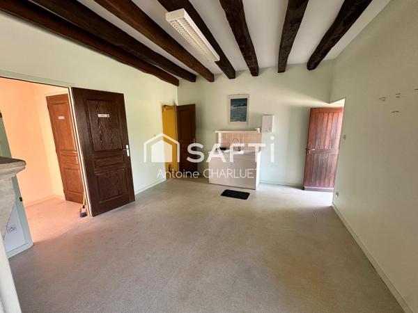 Maison avec beau potentiel locatif.
