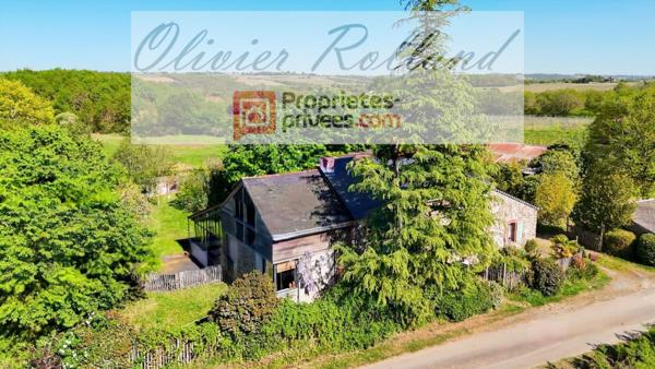 Écrin de Verdure et Authenticité : Demeure de Caractère de 212 m² à Rablay sur Layon