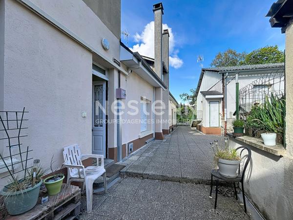 Ensemble immobilier de rapport avec commerce, logements et maison ? Saint-Germain-les-Vergnes