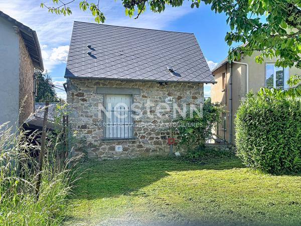Ensemble immobilier de rapport avec commerce, logements et maison ? Saint-Germain-les-Vergnes