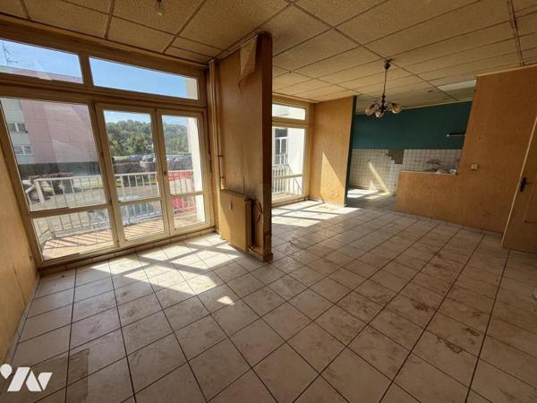Appartement T4 (environ 75 m² habitables) situé au RDC