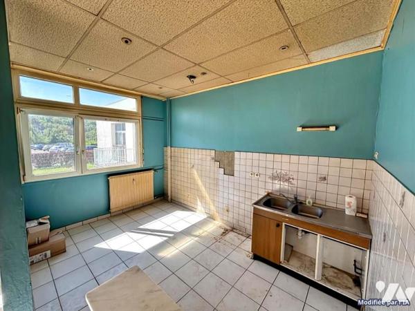 Appartement T4 (environ 75 m² habitables) situé au RDC