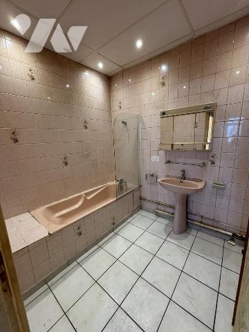 Appartement T4 (environ 75 m² habitables) situé au RDC