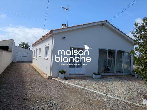 Maison avec terrain et garages