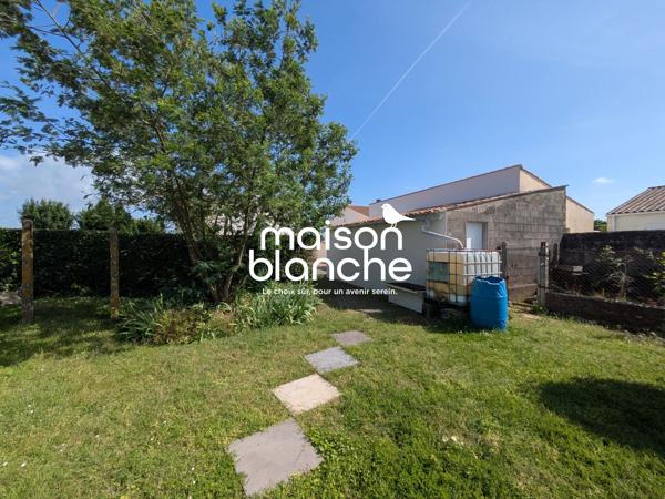 Maison avec terrain et garages