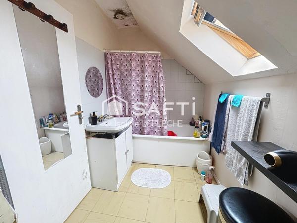 Maison avec jardin, garage et cave