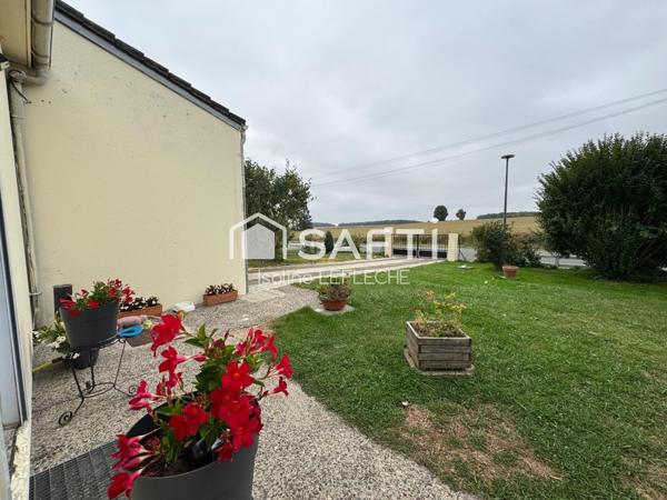 Maison avec jardin, garage et cave