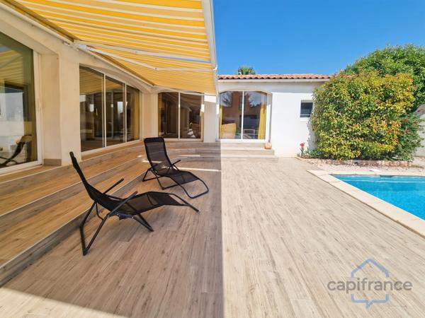 Villa individuelle de 222m² - 8 pièces avec véranda sur terrain arboré de 830m² - Piscine - DPE B