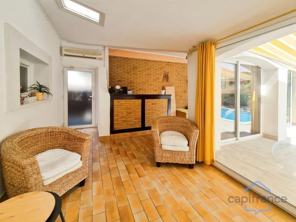 Villa individuelle de 222m² - 8 pièces avec véranda sur terrain arboré de 830m² - Piscine - DPE B
