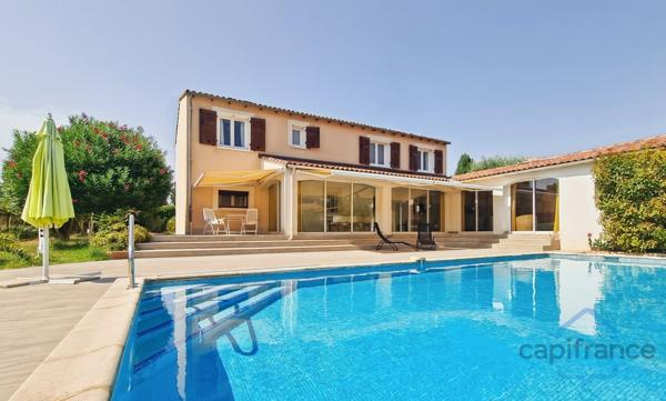 Villa individuelle de 222m² - 8 pièces avec véranda sur terrain arboré de 830m² - Piscine - DPE B