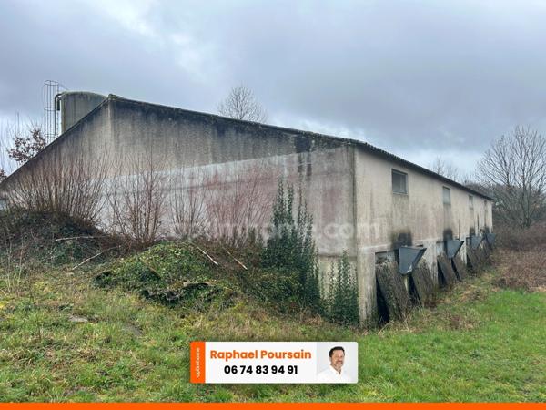 Bâtiment de 420m2 sur 2,9 hectares de terrain et bois.