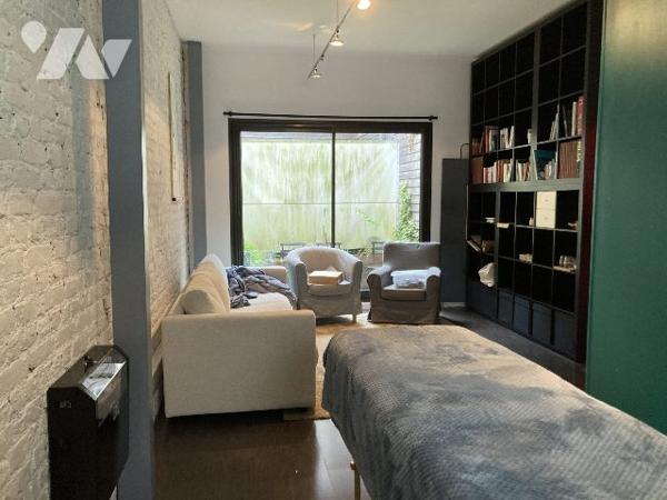 Loft 108m² avec garage et studio loué