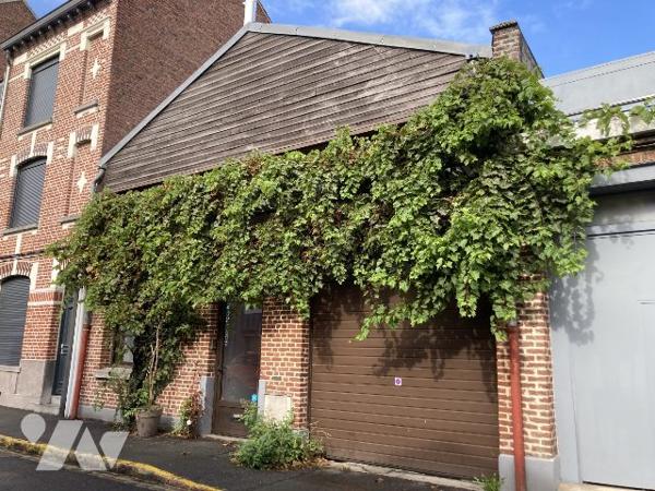 Loft 108m² avec garage et studio loué