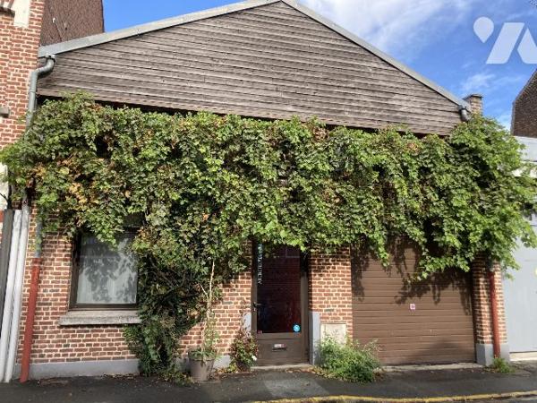 Loft 108m² avec garage et studio loué