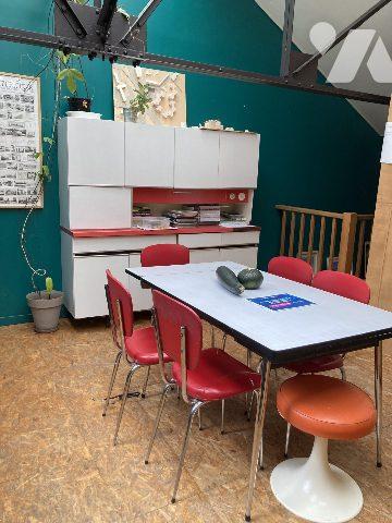 Loft 108m² avec garage et studio loué