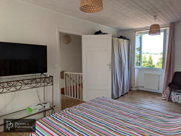 Maison en pierre rénovée avec jardin et dépendances au cœur de Mézin