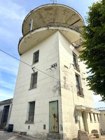 Bâtiment insolite 350 m²